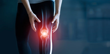 Person with highlighted knee pain indicating a joint or arthritis issue, with a focus on the glowing knee joint.